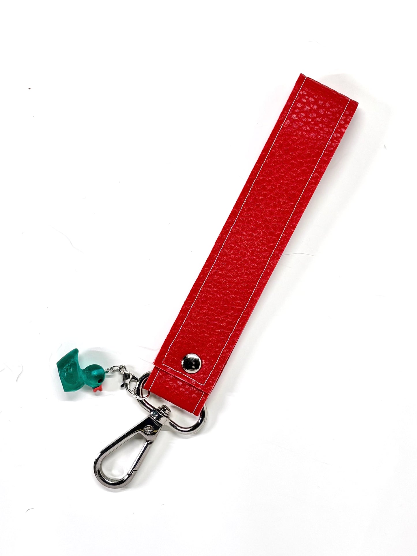 Vegan  leather wristlet with swivel hook and charm