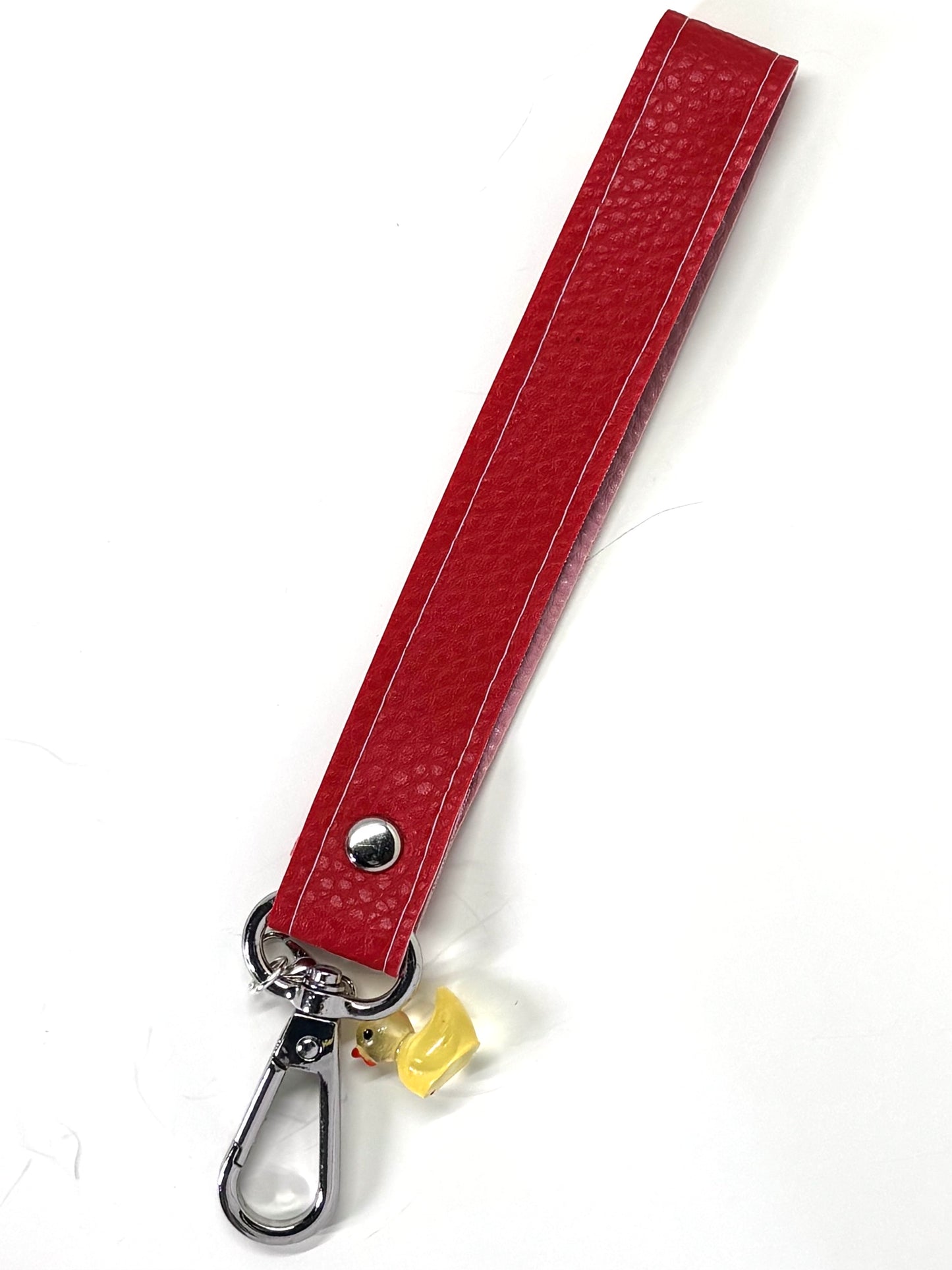 Vegan  leather wristlet with swivel hook and charm