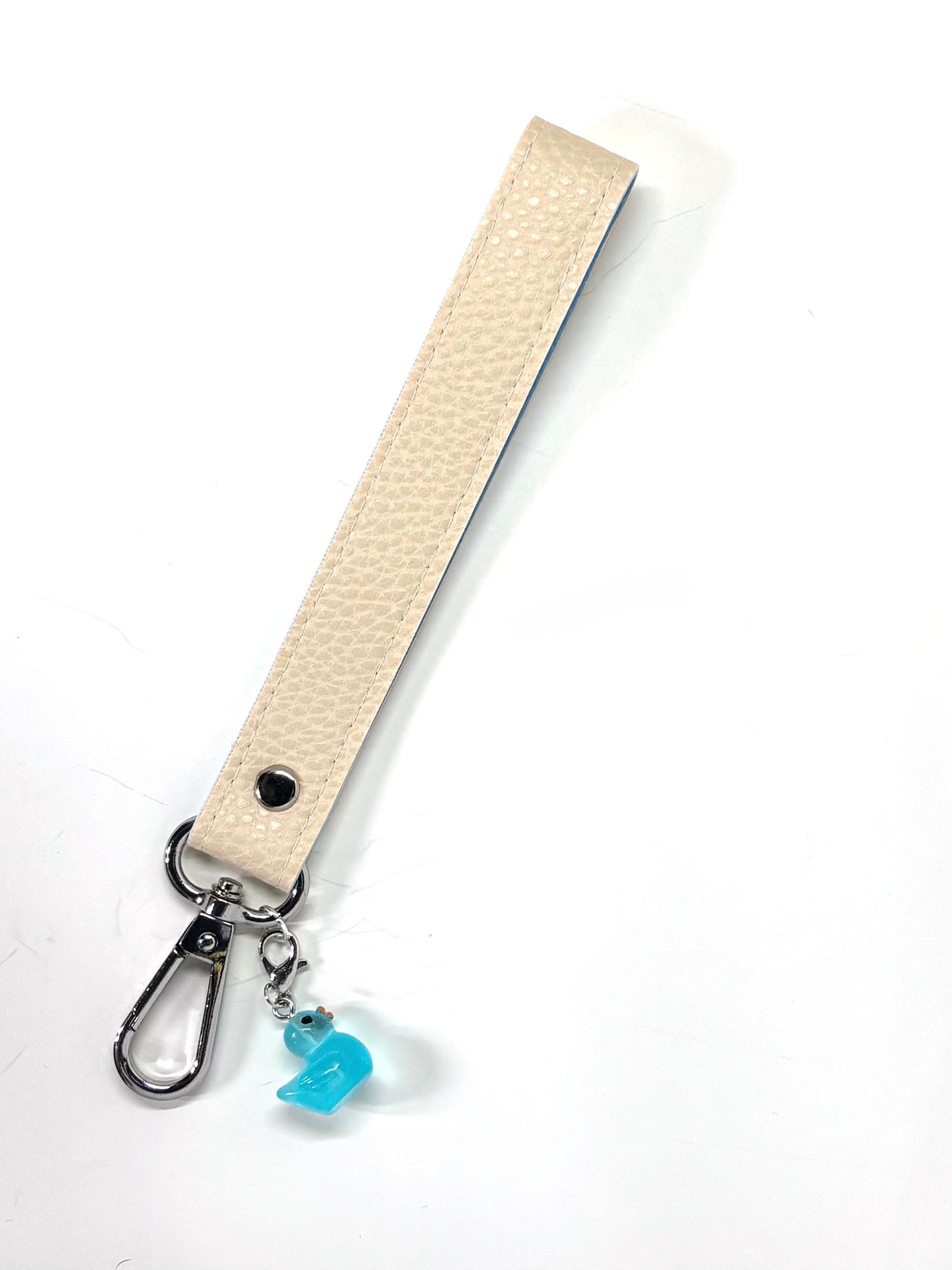 Vegan  leather wristlet with swivel hook and charm