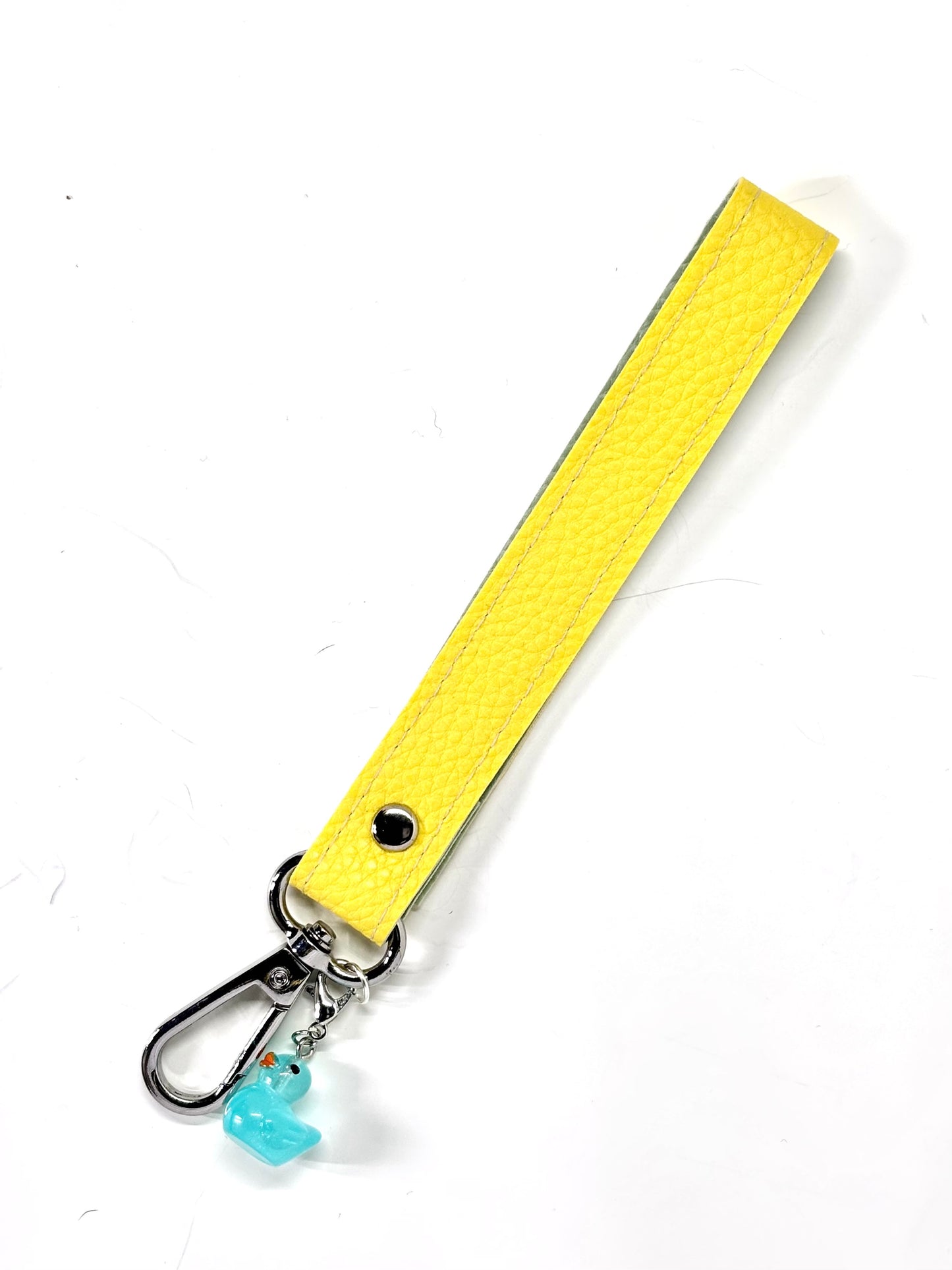 Vegan  leather wristlet with swivel hook and charm