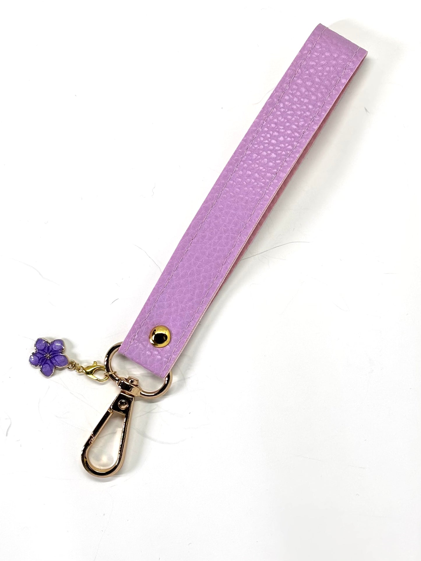 Vegan  leather wristlet with swivel hook and charm