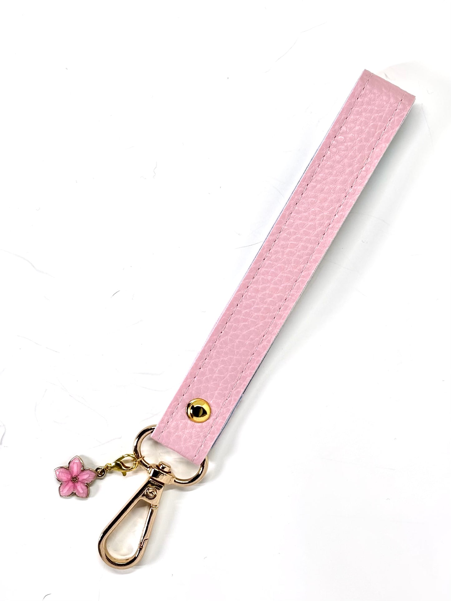 Vegan  leather wristlet with swivel hook and charm