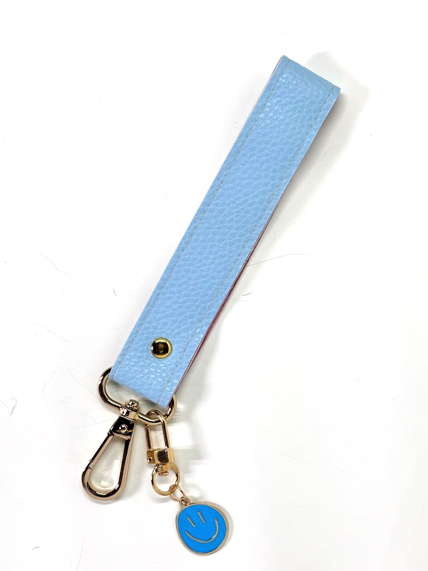 Vegan  leather wristlet with swivel hook and charm