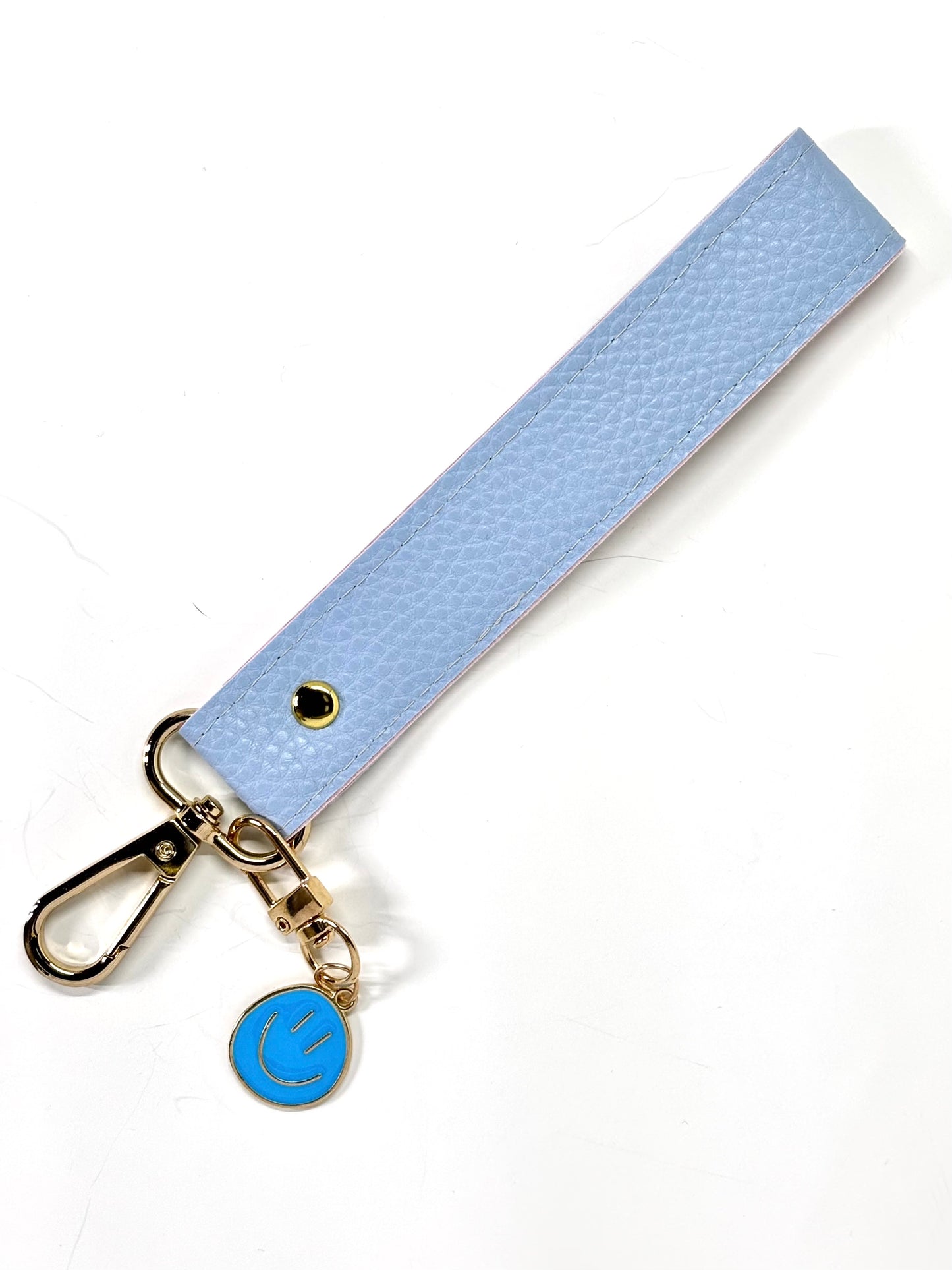 Vegan  leather wristlet with swivel hook and charm