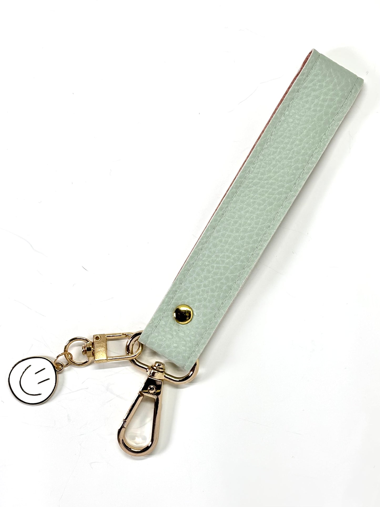 Vegan  leather wristlet with swivel hook and charm